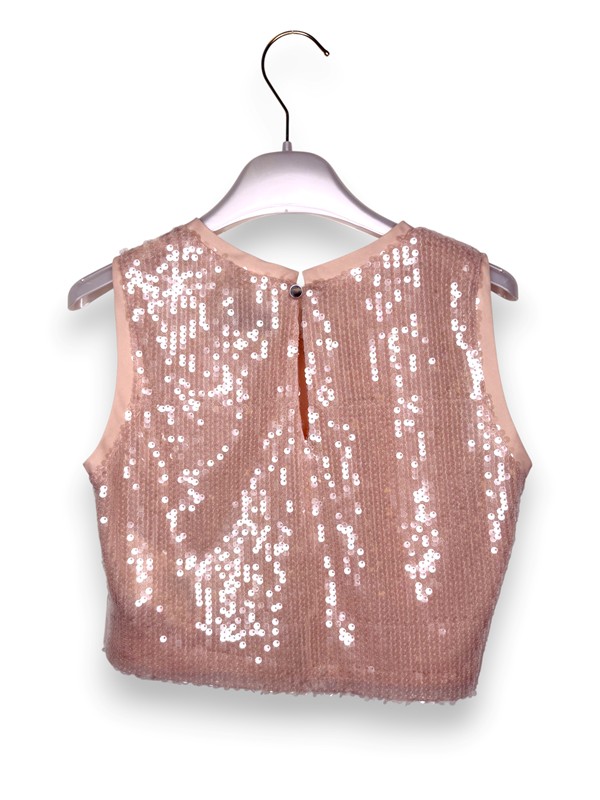 Top paillettes in tinta